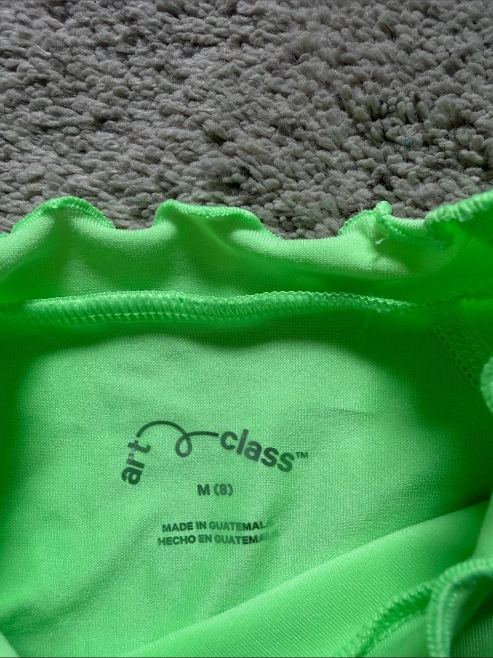 Kids Neon Green Long-Sleeve Ruffle Rash Guard with Smiley Detail - Size 8